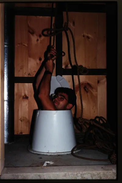 Fall 88 Outhouse dedication victor climbing out